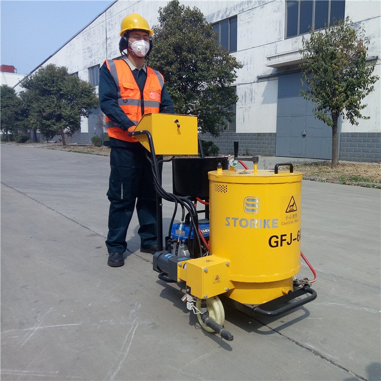 ?60升沥青灌缝机工作进程操作指南